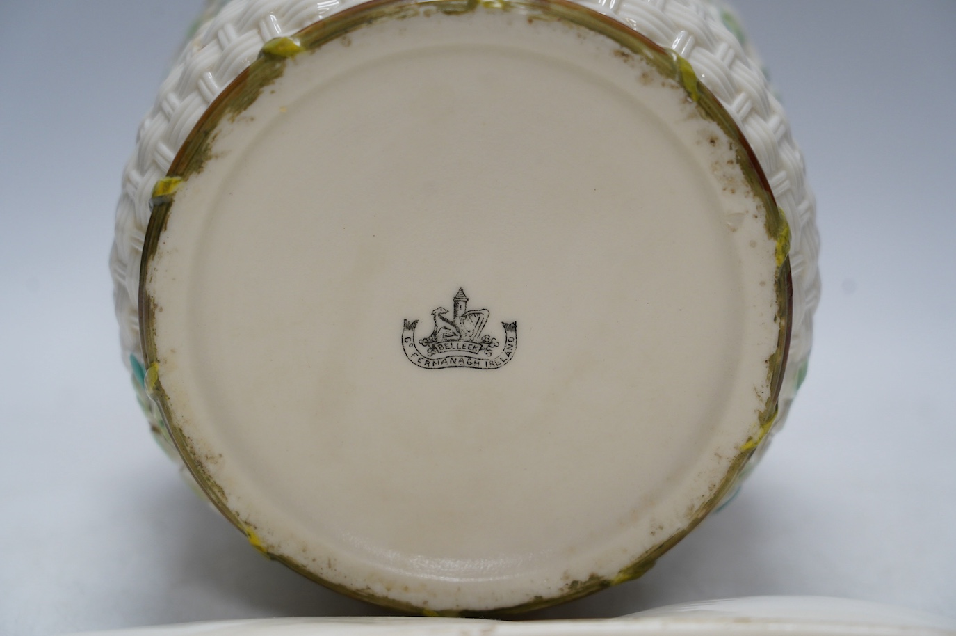 A Belleek cabaret tray and biscuit barrel with cover, clover decoration, 45cm. Condition - cover repaired